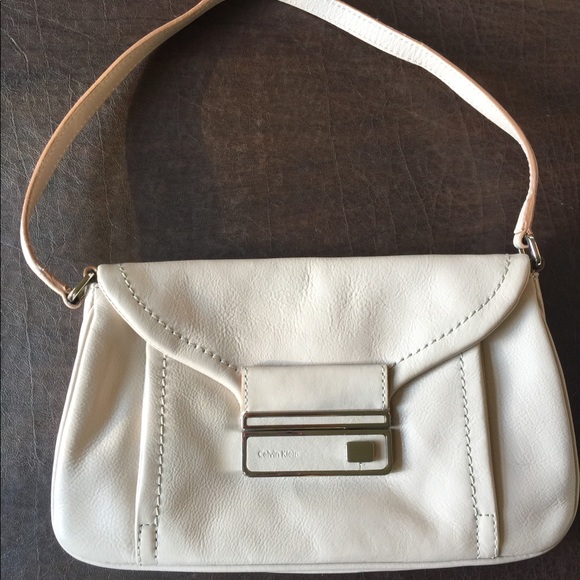 Calvin Klein Handbags - Calvin Klein Cream Toggle Bag - NWOT Calvin Klein Handbags - Calvin Klein Cream Toggle Bag - NWOT